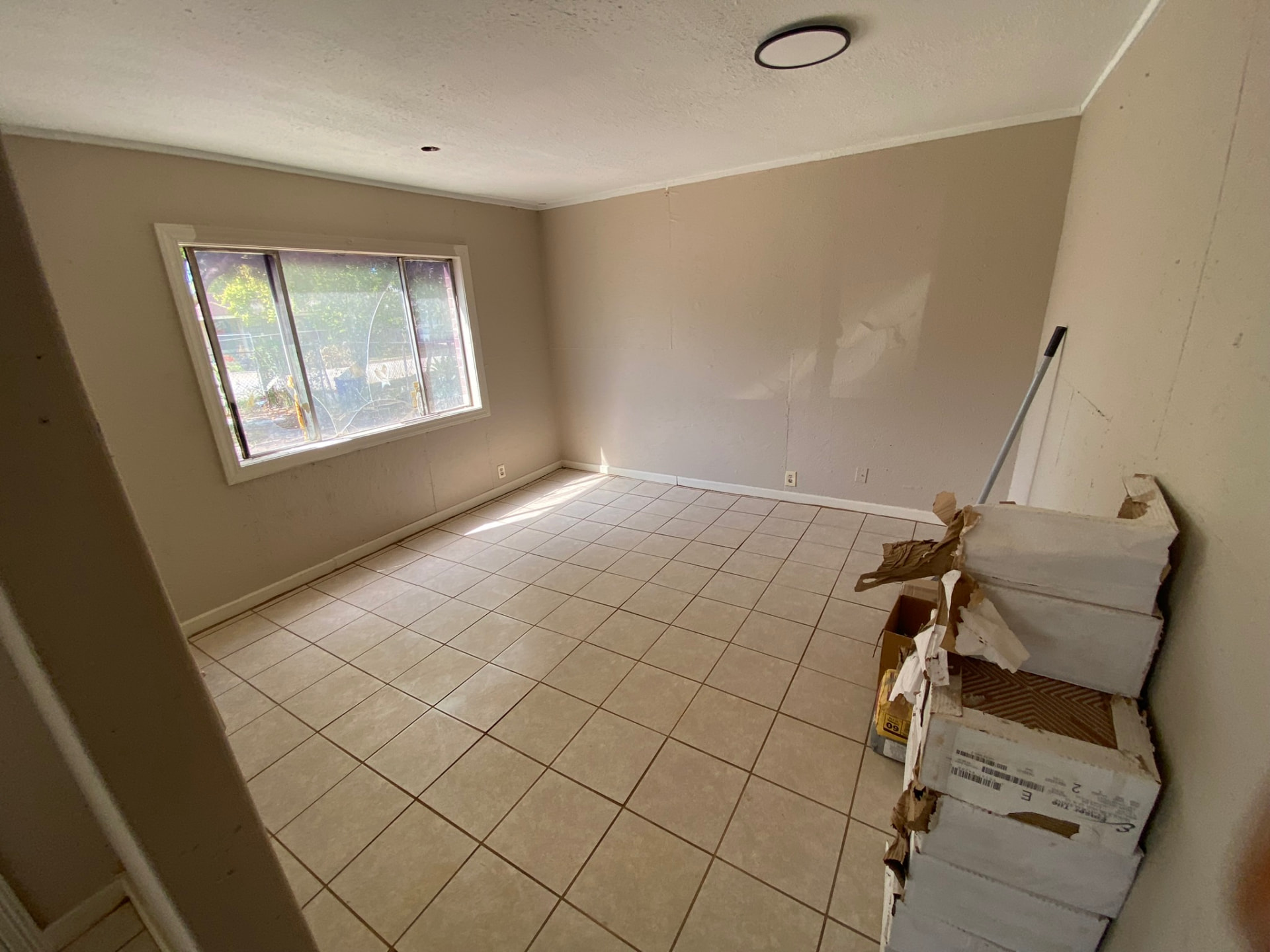 Bedroom tile flooring and repainted walls — Brownsville, TX