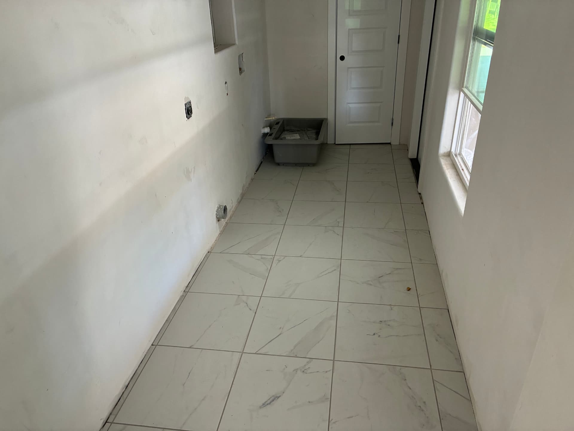 Marble-look tile floor installation — Brownsville, TX