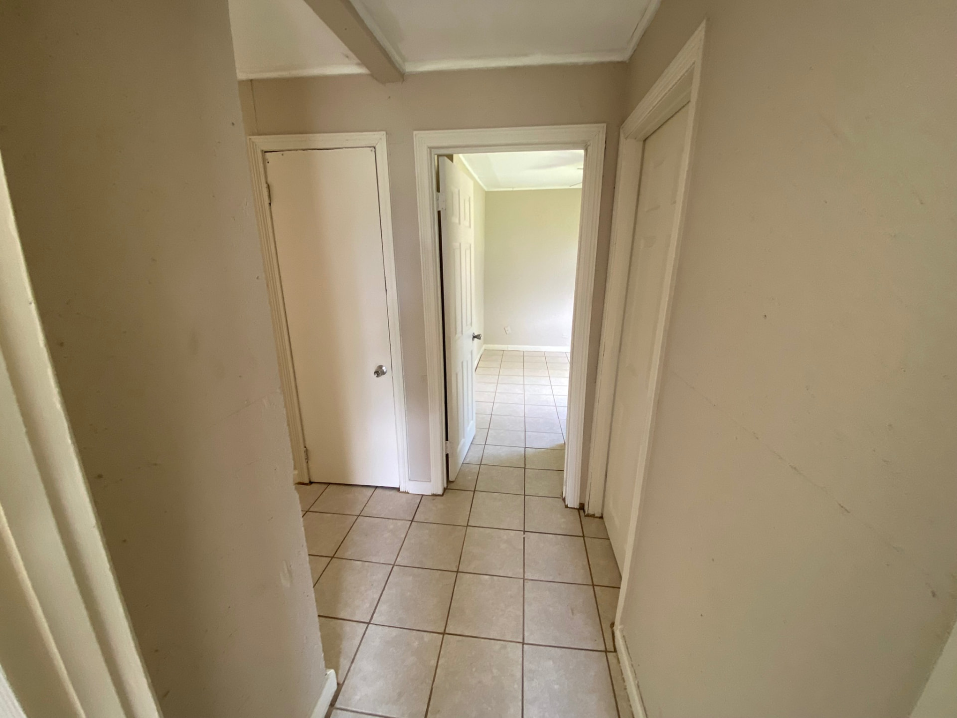 Interior hallway tile and fresh paint — Brownsville, TX