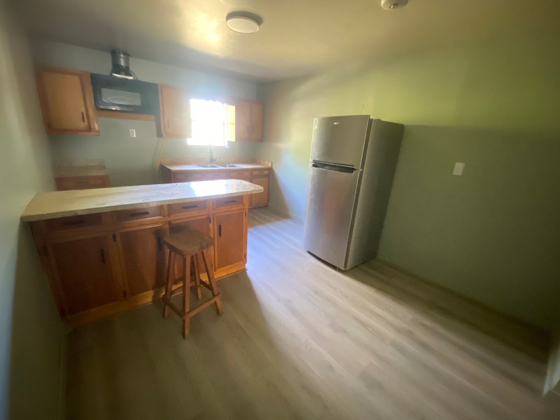 Kitchen refresh with new flooring and paint — Brownsville, TX