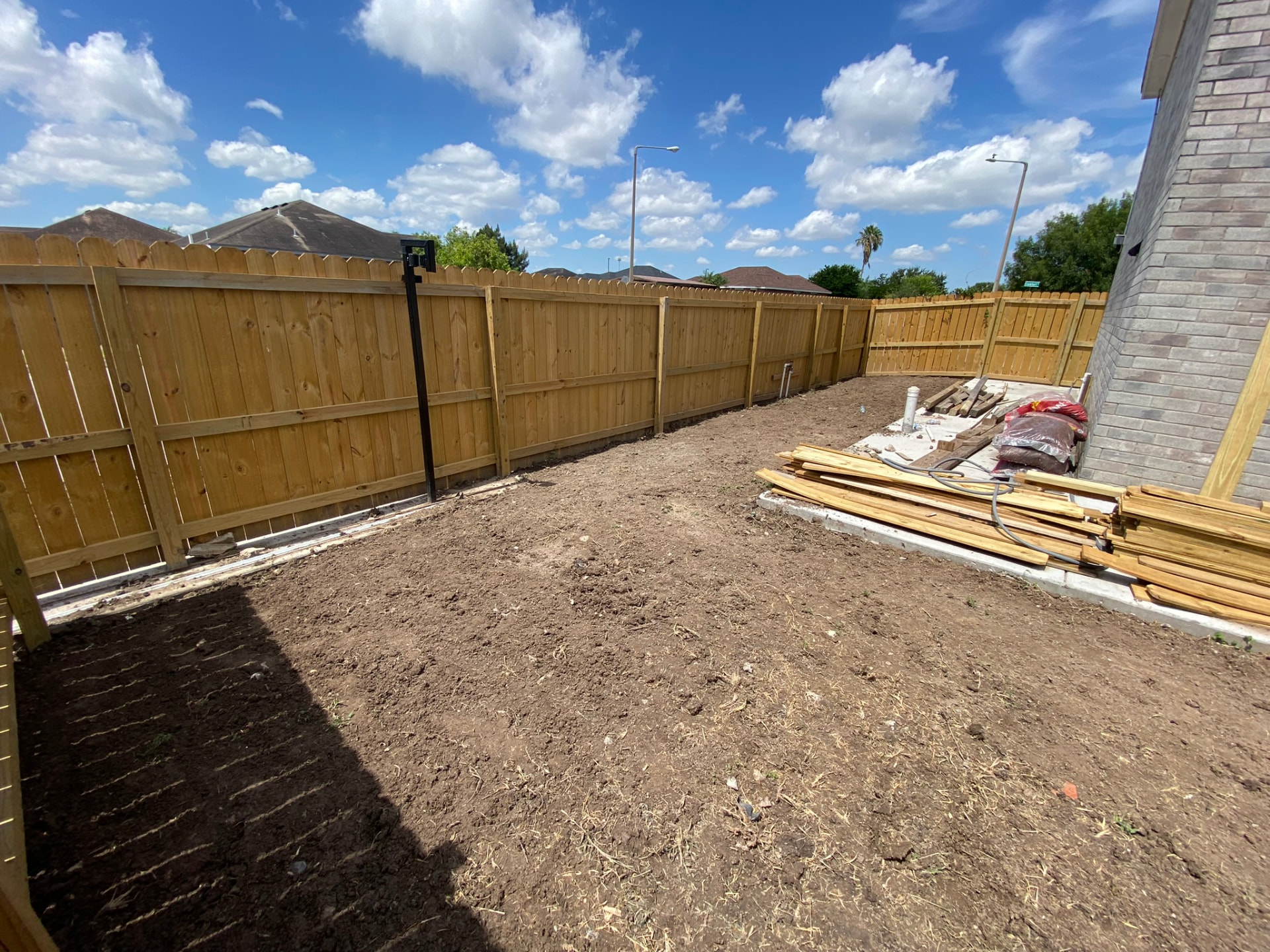 Full backyard wood fence installation — San Benito, TX